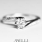 Anello con Diamanti laterali 0.60 Carati D-VVS1