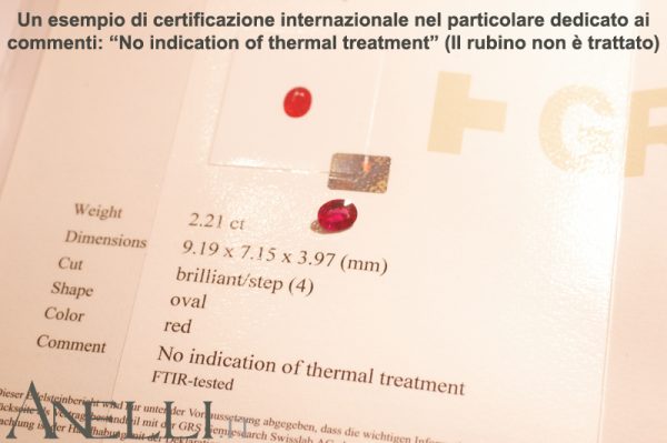 Anello con Rubino e diamanti laterali
